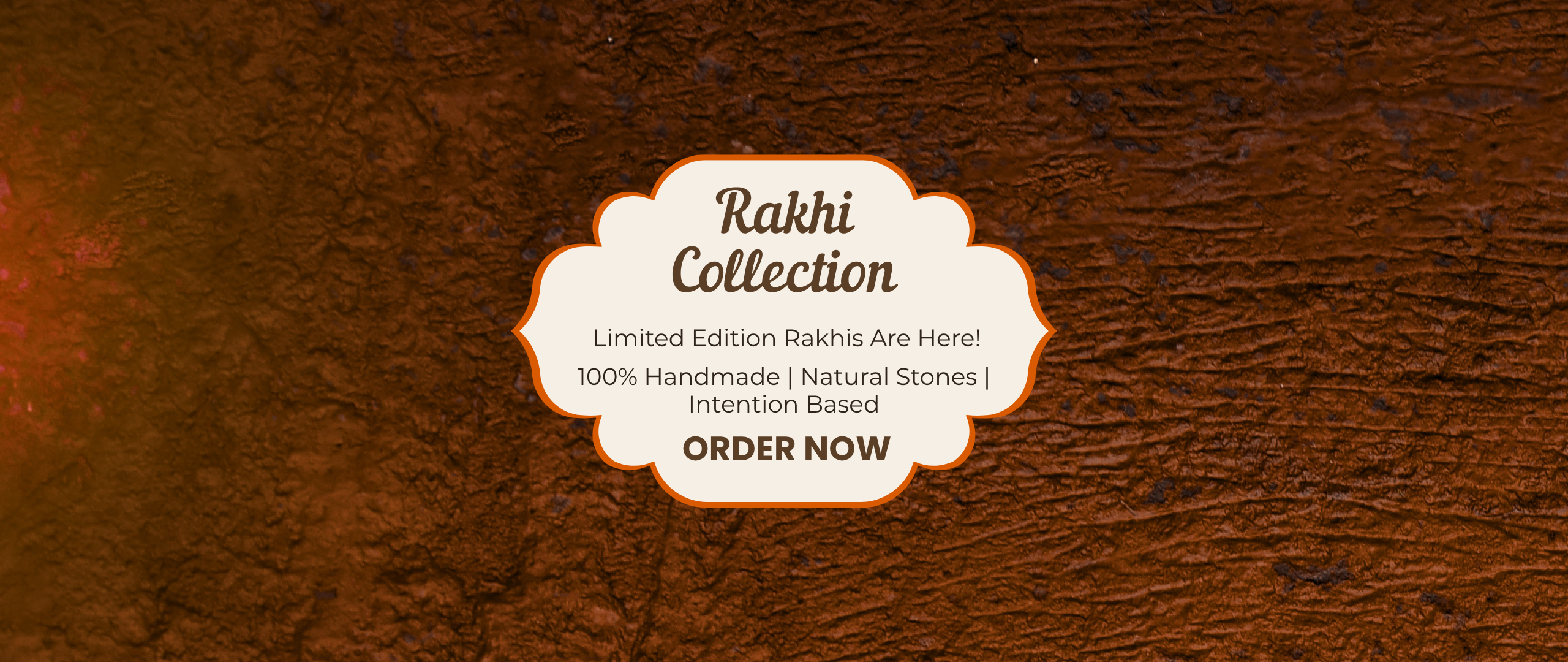 A promotional graphic with a brown textured background and a cream scalloped label reading 'Rakhi Collection' with smaller text about limited edition rakhis and 'ORDER NOW'.